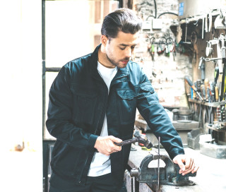 BLOUSON STRETCH MULTIPOCHES